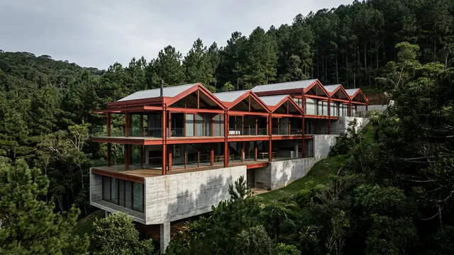 Jevany Villa desafia a floresta tcheca com aço vermelho e geometria industrial