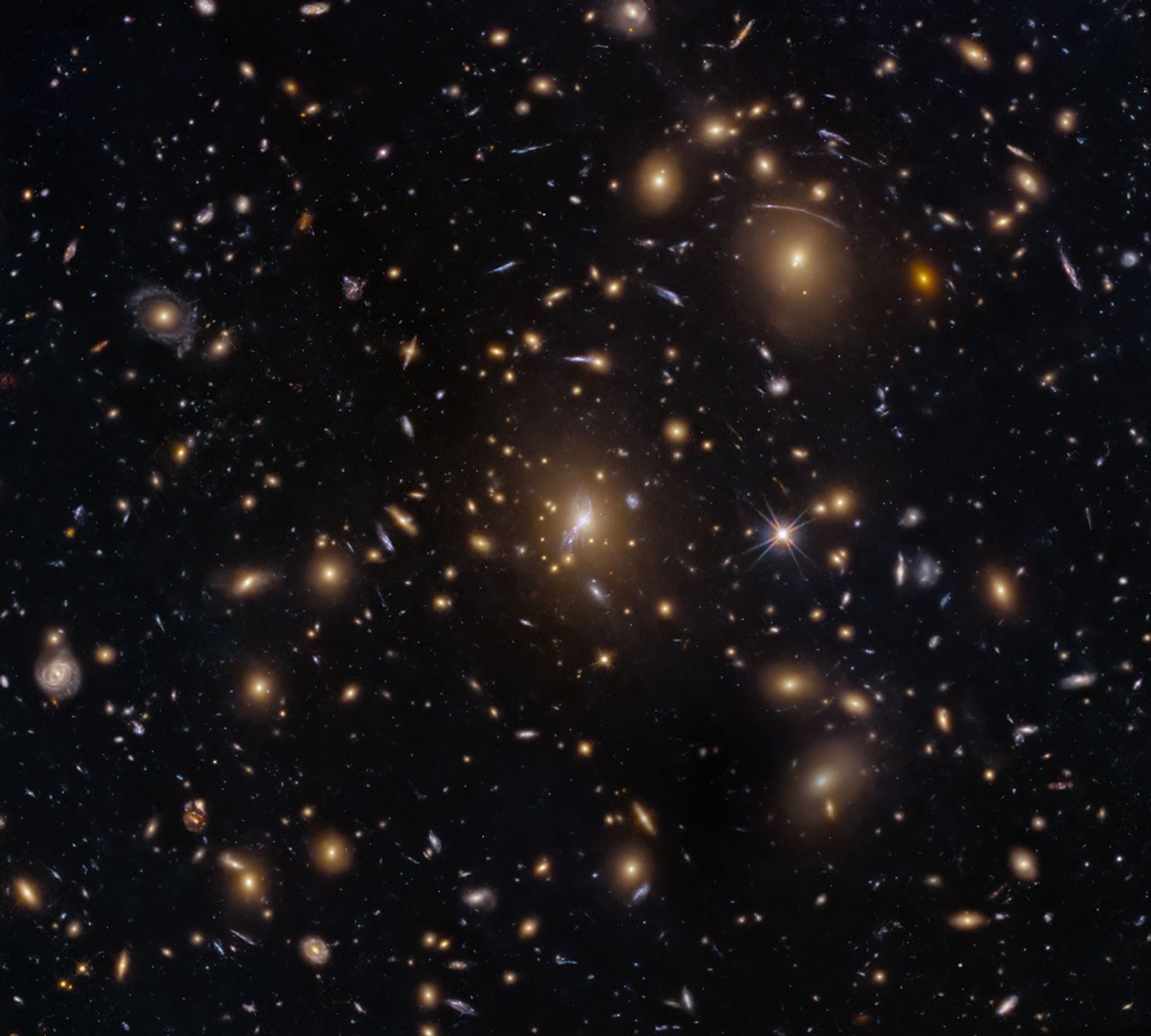 Hubble revela aglomerado MACS0329-0211 — uma lente natural para o passado do universo